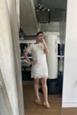 I was pleasantly surprised when I tried this on! I thought it was going to be long on me since I'm short, but it's perfect and so flattering! I will be wearing this for my graduation photos! - Devra S.