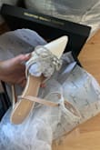 They are more white then in the photos but I love them. Im usually a size 7 but I sized down to 6.5 and they fit perfectly - Vika A.