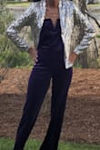 Wore it with the Power of Love jumpsuit and it went together perfectly! Adds a ton of fun to any outfit. Breathable but also kept me warm enough. The only small issue is that if you have  longer or thicker hair, it could get caught on the sequins in the back. But overall great, unique purchase! - Destiny C.