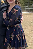 I was in need of a dress for a wedding and I needed it to be breastfeeding friendly.  This dress fit great.  The arms were a bit tight in the arm pit if I needed to move them out in front of me, but this was not a problem.I received many compliments throughout the night. - Megan C.