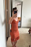 My bottom is 2 sizes larger than my top so it is very difficult to find dresses that fit me properly. I ended up exchanging the S for an XS which fit wonderfully! The crochet is forgiving enough that the XS didn't look stretched to maximum capacity across my booty and and the dress has enough elasticity to keep its form on top against my tiny boobs. I will still probably have the straps taken in a bit (straps are pinned in pic), but I'm very small on top. The top does not have a lining but (on me) you cannot see through the crochet. It IS very form fitting so if you don't want hot weather pillow nips showing through you'll need to wear petals. - Robyn L.