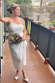 Bought as my wedding dress (casual wedding, second marriage, 40's bride) I usually wear Medium in clothes, but this was way too tight so I exchanged it for a Large and it fits perfectly. It's very figure flattering, sexy but able to be worn around family, and just the right level of fancy. - Kim M.