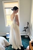 This is a beautiful dress and I loved how I felt in it trying it on! The straps that go around my shoulders/arms were a bit too tight, though, and made that annoying skin/fat part by the armpits stick out - you girls know what I'm talking about here. I'm not busty at all though I do have more of an athletic build, so maybe it had to do with my shoulders? Regardless, I still really liked it. I have some other dresses I want to try on before making a final decision, but if I do go with this dress, I'm going to get the next size up and then just get it tailored to fit me exactly. - Madison M.