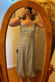 I ordered this springtime dress in a medium but had to return for a large. The medium was so tight and I wear a size 6. I do like the fit of the large and plan on keeping it. I have several bridal showers and engagement parties this summer. What better dress to wear than this one. The little dainty daisies make this dress perfect for Spring and Summer outings. - Catherine S.