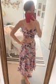 The style of this two piece is very modest, the skirt has just enough fabric to make this flow really nicely as you walk. For a very light-weight material, the colors are striking. - Jackie B.