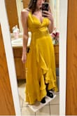 Fits perfectly in the waist, and just a little loose in the bust area (that is usually a problem for me tho). I would not change the size. I will say, the slit goes all the way up to the waist of the dress, but it wouldn't be a problem to safety pin that if you're going out on a windy day! As you can see, you'll want to steam it before you wear it! - Madyson B.