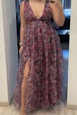 The dress is beautiful, comfortable and well made, the size fit very good. Only the color does not match the one in photos, it's a lot more purple in real life. - ElÄ«na J.