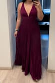 Sits really well, makes me look a lot slimmer than I am. A bit more dark pink than red in real lif, looks stunning. Good for tall girls, in photo Im with very high heels. - Elīna J.