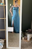 This dress is so gorgeous!! I love the cute bows on top! I wanted a more simple prom dress with a tighter top and a flowy, but not puffy bottom, and this is exactly what I was hoping for!!!! I was worried that the slut was going to be a little too high, but it's perfect!! Definitely recommend!!! - Natalia B.