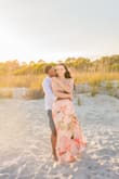 LOVE THIS DRESS! I wore it for beach engagement pics. I normally wear a size 6-8 and ordered a small for a more fitted look. I wore pasties since the chest area has thin fabric.

It's a little long but that was perfect for the beach breeze. - Mimi B.