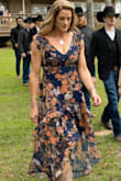 Recently my son got married.  The wedding was held on our family ranch and was a western theme.  I began searching online for the perfect dress and discovered this one at Lulus.  It is a high-low and sheer at the bottom, which was exactly what I had envisioned to show off my coyboy boots.  I was a little nervous because I had never ordered from Lulu's before.  The dress came fairly quickly.  I tried it on right away as I read that returns are free if initiated during the first ten days after receiving your item.  The dress literally fit like a glove, to the point that there was no room for a bra.  Even though the dress was snug, it wasn't uncomfortable, and it looked great!  I was able to slide in some padded bra inserts so that my headlights wouldn't show through the dress.  The dress was a hit!  I received so many comliments, and the best part is I will be able to wear this dress many more times as it is not overly dressy.  

Thank you Lulus for making me look great on my son's special day!= - Jennifer W.