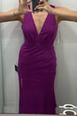Great dress. 

Pros:
The fabric is a little heavy so it feels expensive. 
I like the lining.

Cons:
The zipper feels like it could break and it's also tight, if I gained half a pound it wouldn't close. If I would reorder this dress I would go for a Medium.

The color isn't a dark fuchsia or magenta like shown in the picture, it's more like a purple, exactly Barney's color. I wanted a pink dress, not a purple one so that's a bummer. - Gabriela C.