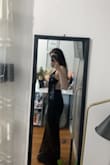 I love this dress! I got it for prom and I tried it on, it's honestly so nice. The material is great and doesn't feel scratchy. It's also the perfect length. - Anika R.
