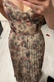 The dress is absolutely stunning! It fits good, the colors are beautiful, is a perfect dress for a perfect event! - Tamer S.