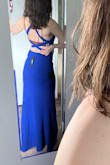 I ordered 3 different dresses for an upcoming event. This ended up being my second favorite. It was tricky to get on, but the quality was excellent and it felt really nice when it was on. The only thing that kept it from being my number one was the way that the seam across the waist combined with the straps across the back made my torso look kind of chunky. I can't really explain it. I think maybe if my boobs were a bit bigger I might not have had that problem. Still a really nice dress but I decided against it. - Aimee D.