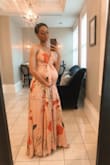 This dress was actually perfect, i was looking for something to wear to my sister in law's wedding while in the midst of being 27 weeks pregnant and this dress ended up being perfect. I got an XXS and was hesitant because I wasn't sure it would be big enough but it actually still fit beautifully. It was a little snug around my belly (to be expected) but it fit gorgeously everywhere else and i cannot wait to get as many wears as possible out of it. I love the material, it's very comfortable, satiny, and it has some weight to it so it's not a thin/cheaply made dress. I'm definitely thrilled and pleased with my purchase! - Shayla E.