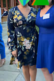 The dress is super nice and professional, with awesome quality and the fabric looks great. I think the big flower print isn't as flattering as other prints. - Daniela F.