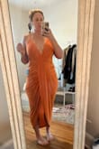 Not normally an orange gal but this dress is so perfect for an upcoming summer wedding. The fit is so flattering and it's crazy comfortable. It's slightly big so I maybe could have swung a large but worst case I'll get it altered. - Kelsey J.