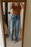 Fabric is sooo soft and the waist fits perfectly. It is just too long so I will wait till a 24 is back in stock then try to order that one. I want them to work because they are super comfy! - Annie F.