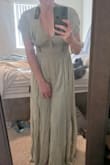 I was hesitant to get this dress because it is a little more pricey than I'd like to spend on a dress, but wow!! It's gorgeous. It is a little tight in the rib cage and bust area, but it's a great fit! The large would be too big, so the medium worked out just fine. I'm squatting a little in the photo because I had a hard time getting the full thing. I wasn't wearing a bra in here because it had already helped the girls out! That's a plus! It's a beautiful dress and would HIGHLY recommend purchasing it. - Harmony K.