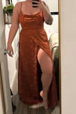 I returned as it didn't fit for the event I wanted, but it fit so great. This photo is sans bra, so it might have fit a bit more flattering up too with one. I'm always an xl in lulus dresses.  Fabric is a little too close to drapes for my taste, but was good quality.   Be careful, this slit will open all the way to the waist if you aren't careful, which is super hot, but could be tragic. - Megan M.
