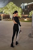 I wore this without a bra or nipple covers and the material was thick enough to keeps the girls secure. I wore this on a late night date with my boyfriend and he loved it. It was confusing at first with all the strings, but once tied, it stayed in place and tight. Loved it! = - Stephanie B.