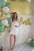 Got this dress for my bridal shower and it looked stunning! The sleeves are flowy and the fabric of the body can stretch so it's comfy too. Length is a tad shorter than I was expecting, but not too sexy to wear in front of family. - Anna C.