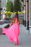 Flowy and wonderful is all I can say. My daughter wore this dress to prom and it was a hit. Color is gorgeous, fit is perfect, she's tall and because of that is hard to fit.  This dress was perfect. - Juli D.