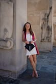 Cute dress for graduation! Ordered a L to start and it was a bit loose in the bust so I sized down and it worked much better. - Caitlin C.