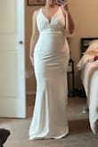 Couldn't be happier with this dress! The quality is amazing, it's very flattering. The material is thick enough to hold you in nicely without restricting any movement. I ended up having the straps altered slightly. I'm 5'4" and the length was perfect when for a 3' - 3.5" heel. - Noemi R.
