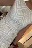 Looks so cute! No give so it holds it's place! Flattering - Jordan R.