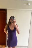 This dress was so flattering and even though I'm small chested maximized my assets. The purple color was lovely. - Angie F.