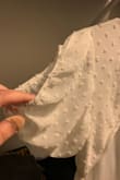 I received this as a faulty product. One sleeve was sewn upside down and the other right. I am very disappointed as I was planning to wear this for graduation pictures and ceremony. As it is a final sale, exchange only I was hoping since this was your mistake then I would be able to get a refund or a new dress - Natalie T.