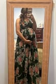 Beautiful dress! Currently 26 weeks pregnant and bought it for an event. I didn't end up going to the event but wanted to share how beautiful this dress is. I could have sized down to the large, but wanted to make sure I had room for the bump so I did an XL. I didn't have on shoes in this pic and you can see it's pretty long. I planned to wear a 3" wedge. It wouldn't have had time to get it altered, but the wedge brought it up enough. If you can handle a higher heel you should be okay. - Amanda C.