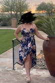 This dress was perfect for a country club wedding. Lightweight and the extra fabric/slip underneath helps when the wind takes you in different directions. The slit in the dress is definitely more at the front. Very comfy overall. - Gretchen S.