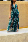 I bought this dress for my daughters 8th grade prom.  It fit her perfectly through the ribcage / waist.  Loved the adjustable straps.  We did have to have the dress altered / hemmed due to her lack of height.  I fully recommend this dress. (picture purposely cropped). - Traci W.