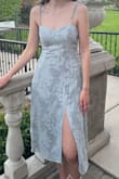 The dress is so flattering yet still modest and was perfect for an outdoor spring wedding. I love that the straps are adjustable, and the stretchy back makes it a perfect fit. The fabric was nice material, and the threads of silver running through it make it shimmer subtly. Such a great value! - Lily H.