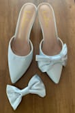 These shoes were really cute and comfortable. However, the first time I wore them (at my bridal shower, indoors only) the bow came off. I was very disappointed in the quality. Do not waste your money. - Leigh W.
