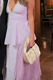 This purse was the perfect addition to my outfit for a wedding. I wore it with champagne sandals and gold jewelry. Loved the look! Now I have an elegant versatile purse that I can pair up with pretty much everything. Quality is great. I recommend! - Sofia G.