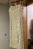 Pros:  Lightweight and lined (summer friendly!)
          Ruched back
          Midi-length looks correct on taller frame
          Sleeve ties are super cute and make the straps adjustable
          Slit is well-made and flutters open in a very attractive way
          Fit is super flattering

Cons: No bust support or cups, would need confidence, pasties, or a strapless bra
          Slit goes really high if you're taller
          Zipper is VERY HARD to get by yourself and gets stuck at the ruching every time
          Would recommend sizing up if you don't want it to fit tightly
          Back bunches up a bit if you've got more of a booty - Caitlin S.