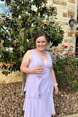 Was super tight/difficult to zip at the waist! But made it work!! Many compliments at the wedding I wore it to. - Caroline A.