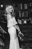 The dress was wonderful. I had the shoulders taken in. - Cheryl K.