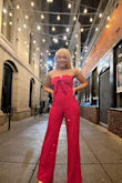 I wore this Jumpsuit for my birthday and it was a hit. I got so many compliments. the color is stunning and vibrant, it's a head-turner. The fit is also amazing, I would suggest getting your exact size so it will fit best. I wore a strapless bra with this but it's necessary, it has enough support that you can feel secure without one. It's also elegant enough to wear to a formal event. I'm in love with this jumpsuit! Lulu always hits the mark on jumpsuits - Evannia M.