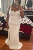 The dress is beautiful but the front was slightly off center for me. I liked the material and shape. - Shyrin K.