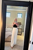 The fit was a bit large until I rolled the waist over. I ordered an XS. My daughter suggested the waist rollover.  I'm a tiny person/very short. I love them & a little bit of spanks underneath doesn't hurt. - Mollie D.