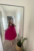 Love this dress! I normally wear a Size 14 so I ordered the XL. It's slightly snug in the back but fits and is so so flattering. I love the material and the fact that it's double lined. I was able to wear it without a bra. - Audrea S.