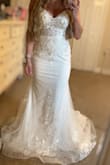 This dress is pretty much my dream dress for a reasonable price! We are eloping and I couldn't imagine myself spending 1000+ on a dress, I never thought I would get something this beautiful for this price! It is super lightweight for how much dress there is! I'm barefoot in the photos and I'm 5'5, I had a hard time getting the entire dress out and flat for pictures by myself. I find it TTS, I'm generally a pretty solid size 6 dress, size 4 pants in AE, 34d bra, and 142 lbs the day the pics were taken. I have a severe case of scoliosis and surprisingly the low back it does not accentuate my curve! - Jennifer R.