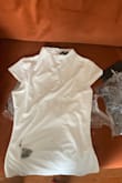 I ordered this bodysuit and was super excited to try it on, only to find out it arrived completely dirty with black residue all over it. Very disappointed. - Erin S.