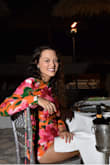 I bought this romper to wear on my honeymoon. It is absolutely stunning!!! Material and quality are amazing. My only issue was that it felt a little too short. I don't think I have a particularly long torso or anything to cause that issue either. I couldn't raise my arms up over my head or everyone would get a show. - Allison D.
