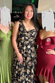 Wore this dress to a work gala and got so many compliments! Length was just perfect - I wore flat sandals and it just skimmed the floor. Dress fit snugly around my belly/waist but wasn't uncomfortably tight or hard to move. Cups for the bust were just slightly too big but solved that easily with some silicone inserts. The shoulder-less side had a grip strip so it didn't slip or fall down. Slit was the right height (not too high or revealing) and provided some great airflow (which prevented the usual type of regional overheating under a skirt/dress). Absolutely recommend this dress to others. - Erika C.